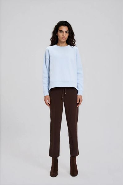 Gładka bluza błękitna. Niebieskie bluzy MOODO, l, bez wzorów, z bawełny, bez kaptura. Za 89.99 zł.