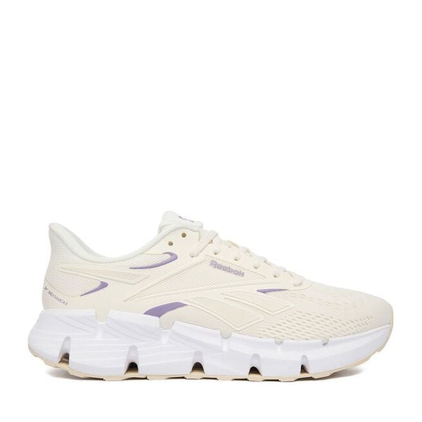 Buty do biegania Reebok. Białe obuwie sportowe Reebok, bez zapięcia, do biegania. Za 232.99 zł.