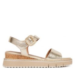 Sandały Tamaris. Żółte sandały Tamaris, bez wzorów, bez obcasa, na koturnie, bez zapięcia. Za 369.99 zł.