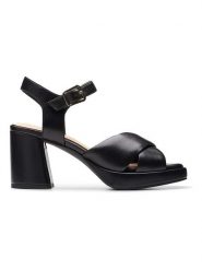 Clarks Skórzane sandały "Ritzy 75 Rae" w kolorze czarnym na obcasie rozmiar: 38. Czarne sandały Clarks, bez wzorów, z otwartym noskiem, bez obcasa, na koturnie, bez zapięcia. Za 217.99 zł.