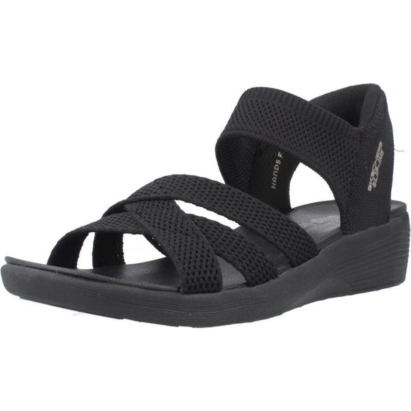 Sandały SKECHERS SLIP-INS ARYA Czarny. Czarne sandały Skechers, bez wzorów, z materiału, bez obcasa, bez zapięcia. Za 390.00 zł.