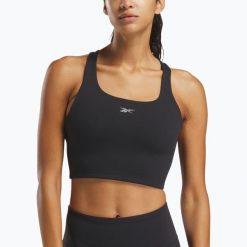 Koszulka Reebok Lux Tank. Czarne bluzki REEBOK FITNESS, bez wzorów, sportowe, bez kołnierzyka, bez ramiączek. Za 179.99 zł.