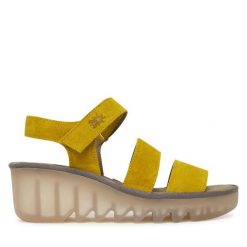 Sandały Fly London. Żółte sandały Fly London, bez wzorów, bez obcasa, na koturnie, bez zapięcia. Za 547.99 zł.