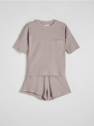 Dwuczęściowa piżama - jasnoszary. Szare piżamy Reserved, bez wzorów, z bawełny, bez ramiączek. W wyprzedaży za 69.99 zł.