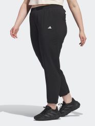 Adidas Spodnie sportowe w kolorze czarnym rozmiar: 4X. Czarne spodnie dresowe Adidas, bez wzorów, z materiału, outdoorowe. Za 110.04 zł.