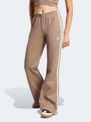 Adidas Spodnie dresowe w kolorze beżowym rozmiar: M. Brązowe spodnie dresowe Adidas, m, bez wzorów, z dresówki. Za 213.18 zł.