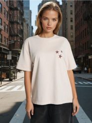 Bluza z krótkim rękawem i napisem na plecach - kremowy. Białe bluzy Sinsay, l, bez wzorów, bez kaptura. Za 35.99 zł.