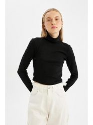 DeFacto Koszulka w kolorze czarnym rozmiar: M. Czarne bluzki DeFacto, m, bez wzorów, bez kołnierzyka, bez ramiączek. Za 86.99 zł.