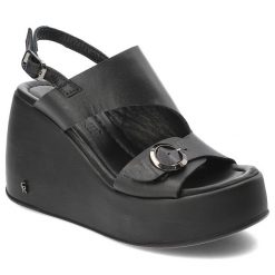 Czarne Sandały Carinii Modne Obuwie Damskie Na Koturnie. Czarne sandały Carinii, bez wzorów, ze skóry, eleganckie, bez obcasa, na koturnie, bez zapięcia. Za 359.00 zł.