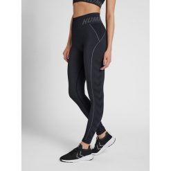 Damskie legginsy ze średnim stanem Hummel TE Christel. Czarne legginsy Hummel, m, bez wzorów, z dzianiny. Za 151.00 zł.