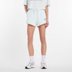 Spodenki damskie New Balance WB61Y80AAAW – miętowe. Zielone szorty New Balance, bez wzorów, z bawełny, klasyczne. Za 199.99 zł.