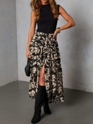Milan Kiss Spódnica w kolorze czarno-kremowym rozmiar: L. Czarne spódnice Milan Kiss, l, bez wzorów, z wiskozy, midi. Za 165.99 zł.