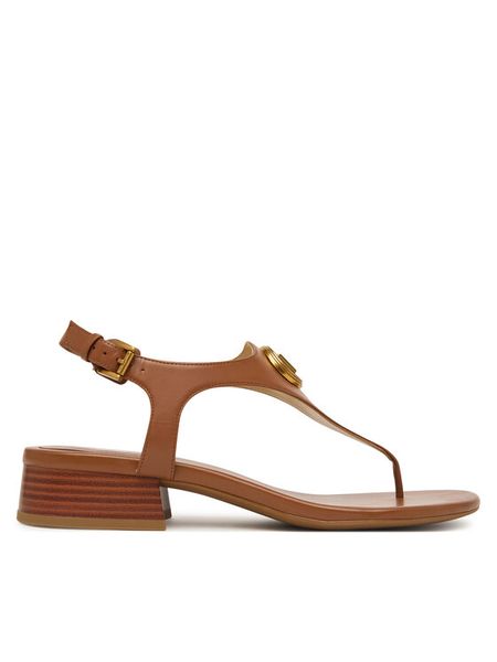 MICHAEL Michael Kors Sandały Mckenzie 40T6MZFS1L Brązowy. Brązowe sandały MICHAEL Michael Kors, bez wzorów, ze skóry, bez obcasa, na płaskiej podeszwie, bez zapięcia. Za 719.99 zł.