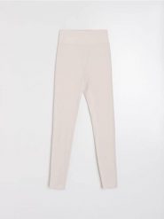 Sportowe legginsy z prążkowanymi panelami modelującymi Gym Hard - kremowy. Białe legginsy Sinsay, l, bez wzorów, prążkowane. Za 39.99 zł.