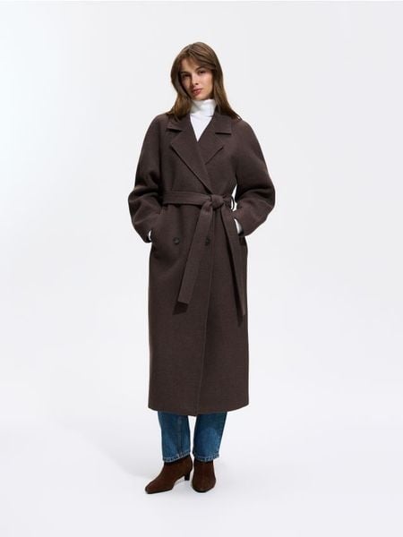 Dwurzędowy płaszcz oversize - ciemnobrązowy. Brązowe płaszcze Reserved, l, bez wzorów, z tkaniny, bez kaptura. Za 299.99 zł.