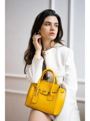 Victor & Hugo Paris Skórzana torebka "Jeny" w kolorze żółtym - 25 x 19 x 7 cm rozmiar: onesize. Żółte torby na ramię Victor & Hugo Paris, bez wzorów, z materiału, przez ramię, bez dodatków. Za 347.99 zł.
