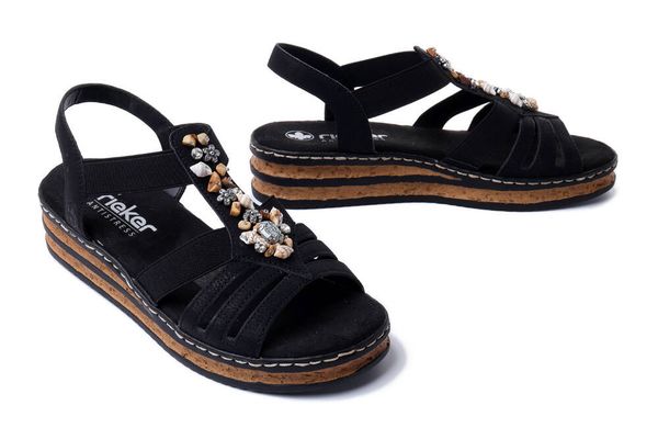 RIEKER 62949-00 black, sandały damskie. Czarne sandały Rieker, bez wzorów, bez obcasa, na koturnie, bez zapięcia. Za 254.92 zł.
