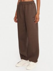 Reebok Spodnie dresowe Reebok X Ewa Chodakowska RK25304CCW Brązowy Regular Fit. Brązowe spodnie sportowe Reebok, xs, bez wzorów, z dresówki. Za 179.99 zł.