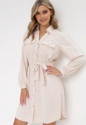 Beżowa Bawełniana Sukienka Koszulowa Aravia. Brązowe sukienki Born2be, l, bez wzorów, z bawełny, bez kołnierzyka, bez ramiączek, mini, koszulowe. Za 119.99 zł.