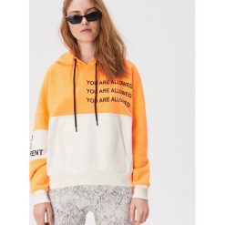 Bluza z neonowym panelem - Pomarańczowy. Bluzy Sinsay. Za 59.99 zł.