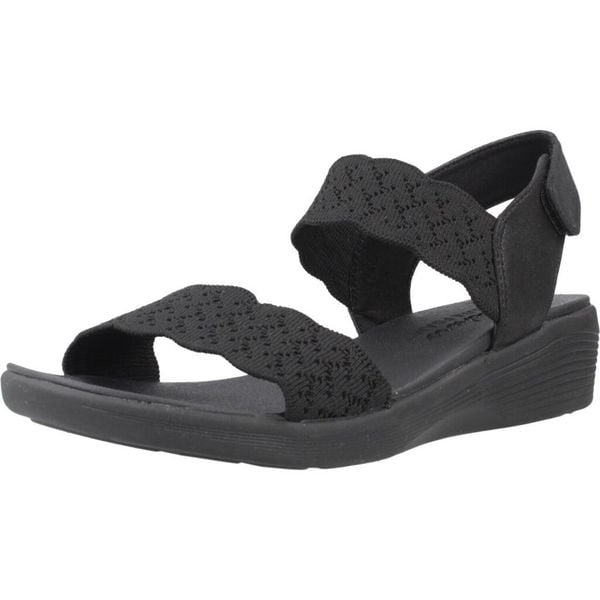 Sandały SKECHERS ARYA Czarny. Czarne sandały Skechers, bez wzorów, z materiału, bez obcasa, bez zapięcia. Za 238.99 zł.