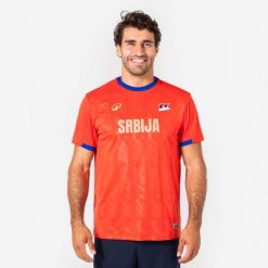 Koszulka piłkarska Serbia dla kibiców. Czerwone bluzki KIPSTA, l, bez wzorów, z materiału, sportowe, bez kołnierzyka, bez ramiączek. Za 44.99 zł.