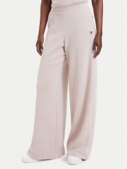 Guess Spodnie dresowe V4YB07 KCAY2 Różowy jasny Relaxed Fit. Czerwone spodnie dresowe Guess, s, z aplikacjami, z dresówki. Za 394.99 zł.