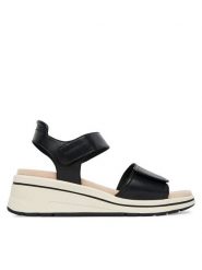 Caprice Sandały 9-28305-46 Czarny. Czarne sandały Caprice, bez wzorów, ze skóry, bez obcasa, na koturnie, bez zapięcia. Za 228.99 zł.