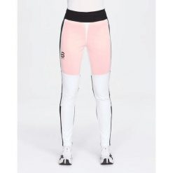 Spodnie narciarskie dla kobiet Daehlie Sportswear Thermo Pro. Białe spodnie narciarskie DAEHLIE, l, bez wzorów, z materiału, narciarskie. Za 800.50 zł.