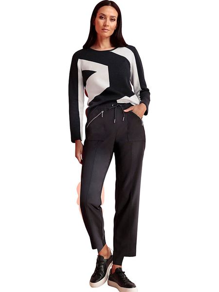 Heine Spodnie dresowe w kolorze czarnym rozmiar: 40. Czarne spodnie dresowe Heine, bez wzorów, z dresówki. Za 105.14 zł.