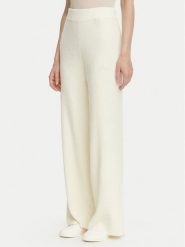 Guess Spodnie dzianinowe O6BB01 Z1147 Kremowy Regular Fit. Białe spodnie materiałowe Guess, xl, z aplikacjami, z dzianiny. Za 344.99 zł.