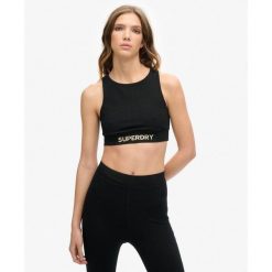 Top sportowy z logo. Czarne bielizna sportowa Superdry, bez wzorów. W wyprzedaży za 153.95 zł.