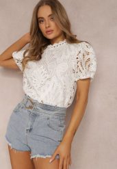 Biała Bluzka Koronkowa Fanoos. Białe bluzki Renee, m, w ażurowe wzory, z koronki, vintage, bez kołnierzyka, bez ramiączek. W wyprzedaży za 76.99 zł.