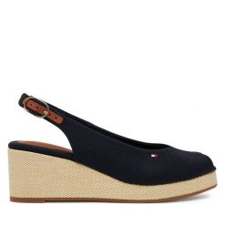 Sandały Tommy Hilfiger. Niebieskie sandały TOMMY HILFIGER, bez wzorów, bez obcasa, na koturnie, bez zapięcia. Za 299.99 zł.