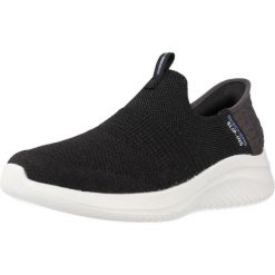 Kapcie SKECHERS SLIP-INS: SUMIT Czarny. Czarne obuwie domowe Skechers, bez wzorów, z tkaniny, bez zapięcia. Za 339.99 zł.