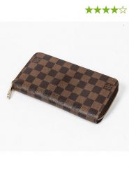 Louis Vuitton Portfel w kolorze brązowym - 19,5 x 10 x 2,5 cm rozmiar: onesize. Brązowe portfele Louis Vuitton, bez wzorów, z materiału. Za 2,253.99 zł.