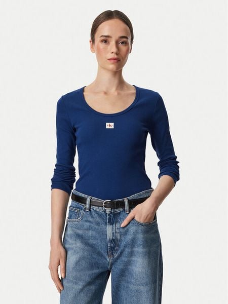 Calvin Klein Jeans Bluzka LV047D218G Niebieski Slim Fit. Niebieskie bluzki Calvin Klein Jeans, s, bez wzorów, z bawełny, bez kołnierzyka, bez ramiączek. Za 209.99 zł.
