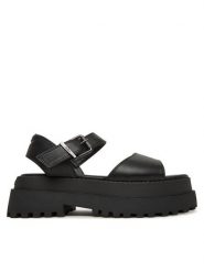 Buffalo Sandały Pluto Jojo 1602267 Czarny. Czarne sandały Buffalo, bez wzorów, ze skóry, bez obcasa, na koturnie, bez zapięcia. Za 289.99 zł.
