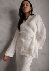 Biała Wiskozowa Bluzka z Kopertowym Dekoltem i Wiązaniem z Boku Velarila. Białe bluzki Renee, l, bez wzorów, z materiału, bez kołnierzyka, bez ramiączek. Za 129.99 zł.