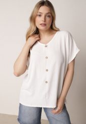 Biała Bluzka z Bawełną o Nietoperzowym Kroju z Guzikami Mistwin. Białe bluzki Born2be, l, bez wzorów, z bawełny, klasyczne, bez kołnierzyka, bez ramiączek. Za 49.99 zł.