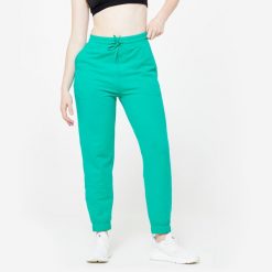 Spodnie dresowe damskie Domyos Gym & Pilates. Zielone spodnie dresowe DOMYOS, s, bez wzorów, z bawełny, na fitness i siłownię. W wyprzedaży za 49.99 zł.