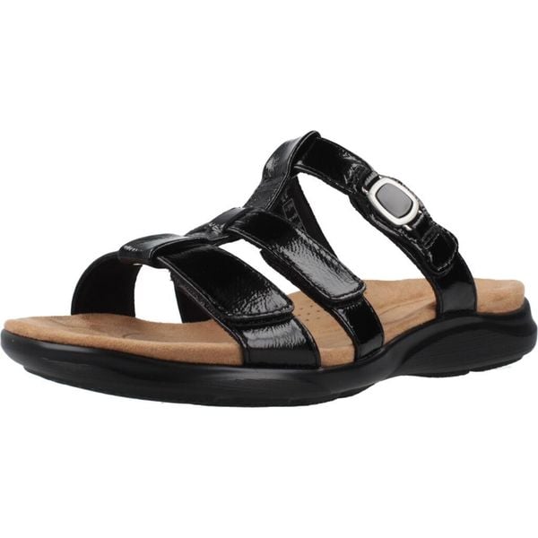 Sandały CLARKS 26185965C Czarny. Czarne sandały Clarks, bez wzorów, ze skóry, bez obcasa, bez zapięcia. Za 422.99 zł.