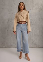 Niebieskie Szerokie Jeansy z Bawełną High Waist Ozdobione Przeszyciami Timolis. Niebieskie jeansy Renee, l, bez wzorów, z podwyższonym stanem. Za 119.99 zł.