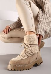 Ciemnobeżowe Futerkowe Śniegowce na Tłoczonej Podeszwie Ozdobionej Cyrkoniami Rialuna. Brązowe trapery i śniegowce Renee, z jeansu. Za 99.99 zł.