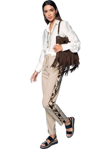 Heine Bluzka w kolorze kremowym rozmiar: 36. Brązowe bluzki Heine, bez wzorów, bez kołnierzyka, bez ramiączek. Za 65.07 zł.