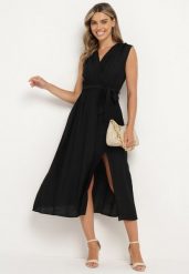 Czarna Rozkloszowana Sukienka z Wiskozą Kopertowym Dekoltem i Materiałowym Paskiem w Talii Jenvia. Czarne sukienki Born2be, na spacer, na lato, l, bez wzorów, z materiału, wizytowe, bez kołnierzyka, bez ramiączek, kopertowe. Za 119.99 zł.