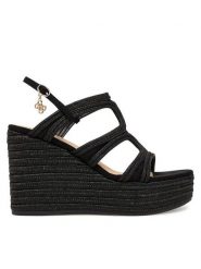 Guess Sandały FLJERS FAB04 Czarny. Czarne sandały Guess, z aplikacjami, z materiału, bez obcasa, na koturnie, bez zapięcia. Za 679.99 zł.