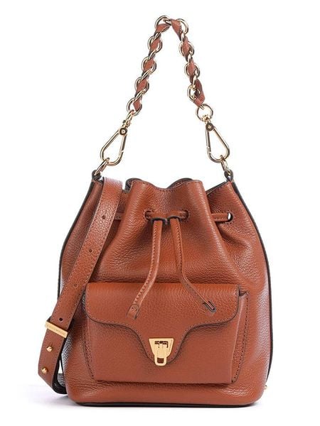 COCCINELLE Skórzana torebka w kolorze jasnobrązowym - 21 x 28,5 x 14 cm rozmiar: onesize. Brązowe torby na ramię Coccinelle, bez wzorów, z materiału, na ramię, bez dodatków. Za 918.12 zł.