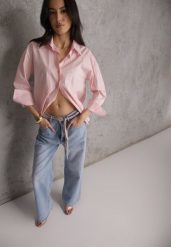 Niebieskie Jeansy Szerokie z Bawełną High Waist Ozdobione Wiązanym Sznurkiem Neviolla. Niebieskie jeansy Renee, l, bez wzorów, z podwyższonym stanem. Za 119.99 zł.