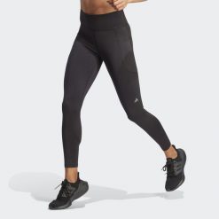 Legginsy DailyRun 7/8. Czarne legginsy Adidas, xs, bez wzorów. W wyprzedaży za 237.95 zł.